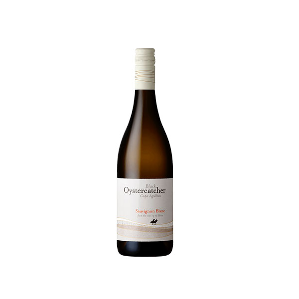 Tall, elegant Bordeaux-style bottle with black screw cap and clean label; pale yellow wine visible through clear glass and faint green reflections.
